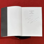 The book "Anatoly Karpov. On the 50th anniversary of the twelfth World Chess Champion" with an inscription and an autograph
