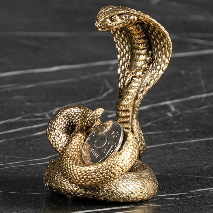 Patinated brass statuette "Snake with a coin"