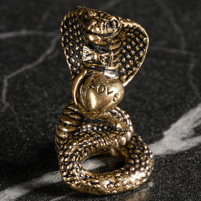 Patinated brass statuette "Snake with a heart"