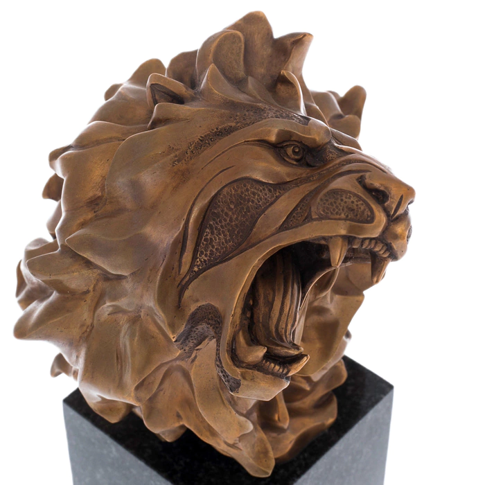 The author's bronze sculpture "Lion's Grin" on a marble stand