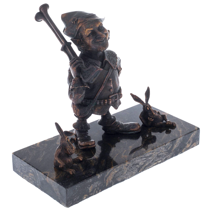The author's bronze sculpture "The Gnome Hunter" on a marble stand