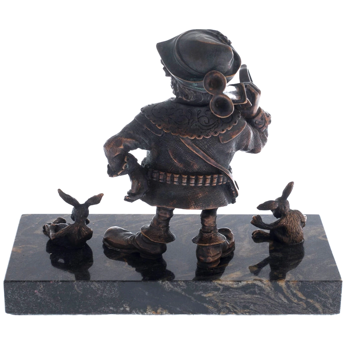The author's bronze sculpture "The Gnome Hunter" on a marble stand