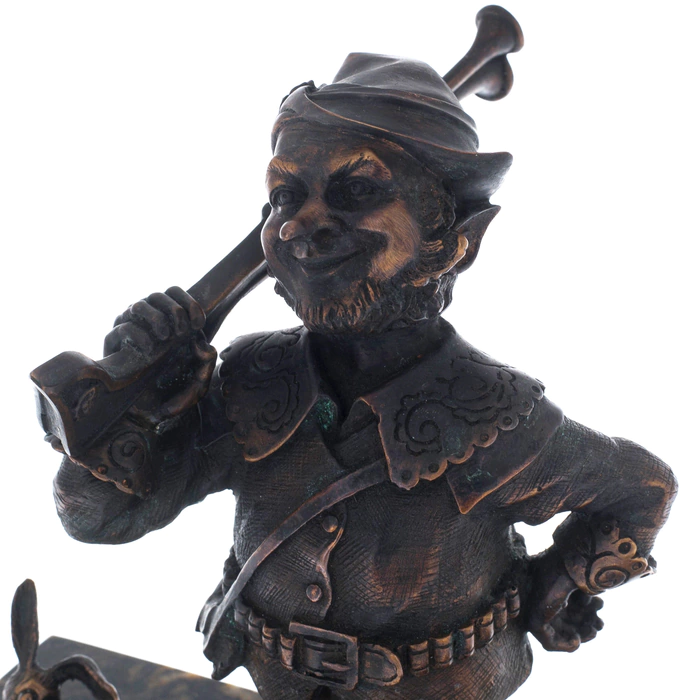 The author's bronze sculpture "The Gnome Hunter" on a marble stand