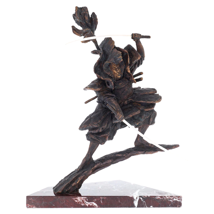 The author's bronze sculpture "Katana master" on a marble stand