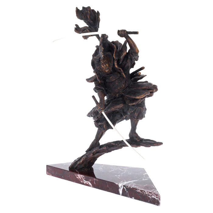 The author's bronze sculpture "Katana master" on a marble stand