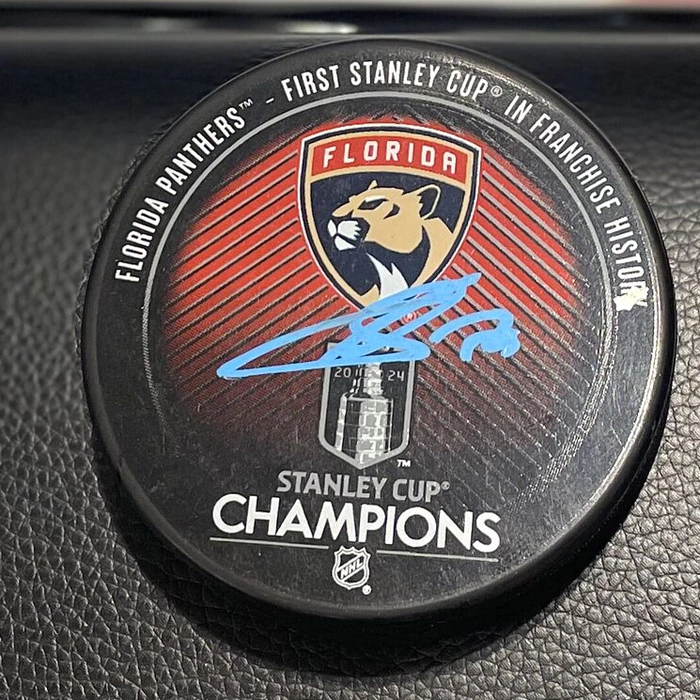 An autographed puck by hockey player Sergei Bobrovsky