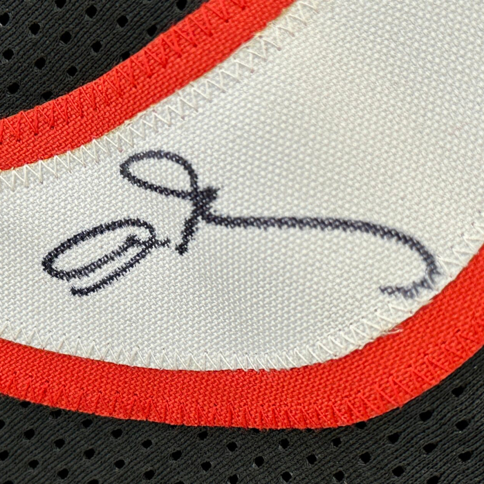 An autographed T-shirt by basketball player Allen Iverson
