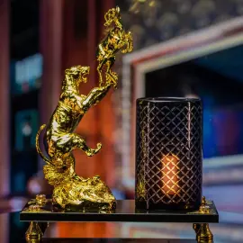 Composition "Lioness" with a candlestick