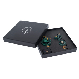 Set of Christmas tree toys made of jewelry resin "Stories - Dragon and Snake" with malachite and pyrite