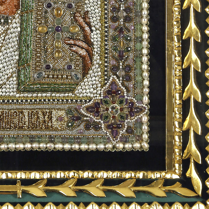 The embroidered icon "The Lord Almighty" in an antique frame and a kiosk