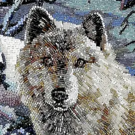 Decorative embroidered panel made of precious stones "Wolf in the winter forest" in a metal frame