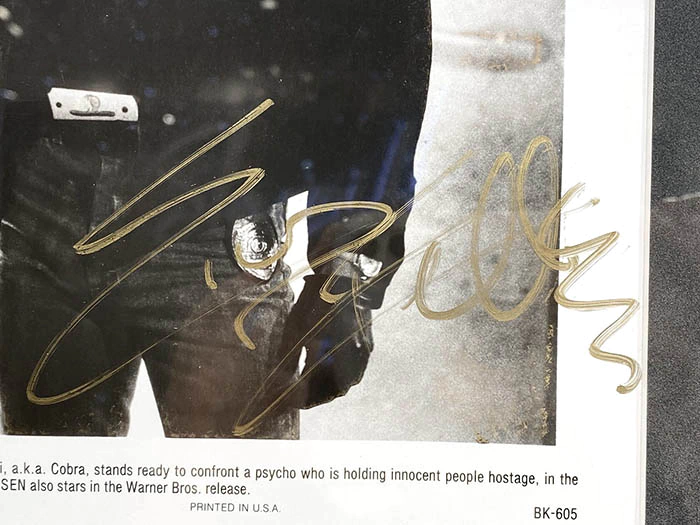 An autographed photo of actor Sylvester Stallone