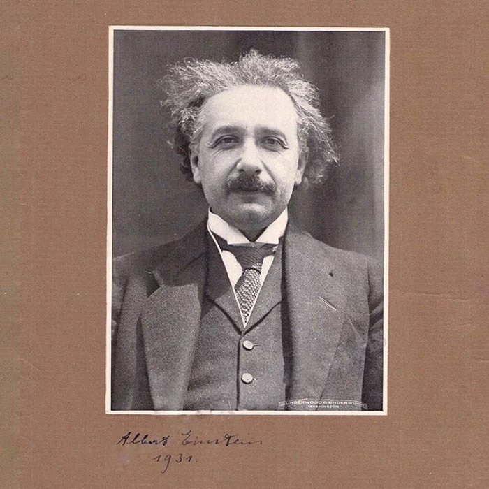 An autographed photo of the scientist Albert Einstein