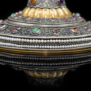 A unique bowl made of silver, gemstones and pearls