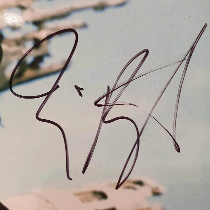 An autographed photo by filmmaker Tim Burton