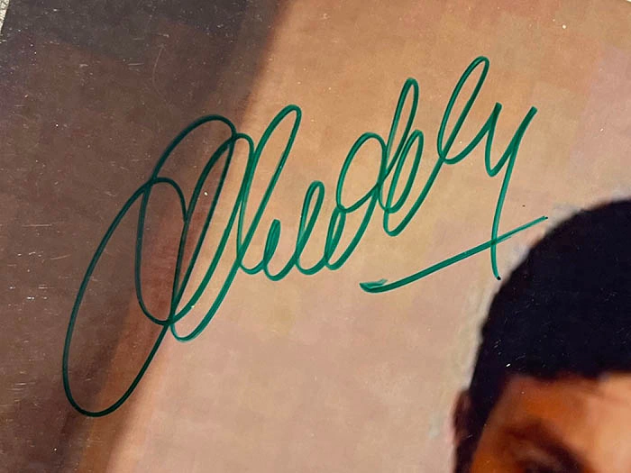 Autographed photo of actor Alain Delon