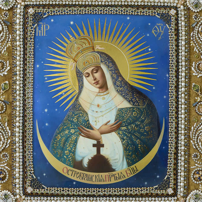 The embroidered icon "Our Lady of Ostrobram" in a frame
