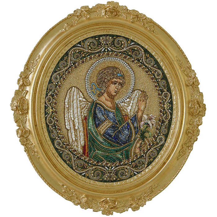 The embroidered icon of the Annunciation. Archangel Gabriel" in a frame