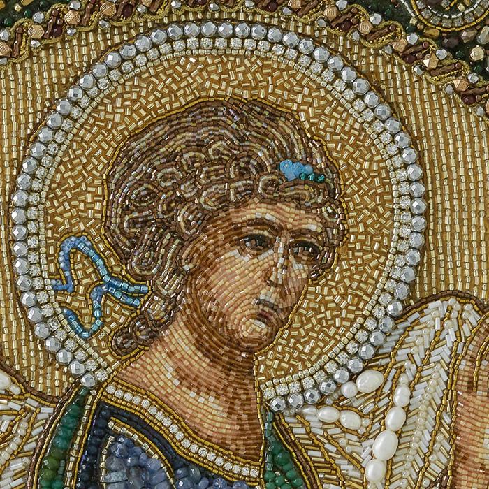The embroidered icon of the Annunciation. Archangel Gabriel" in a frame