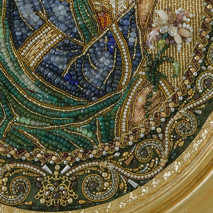 The embroidered icon of the Annunciation. Archangel Gabriel" in a frame