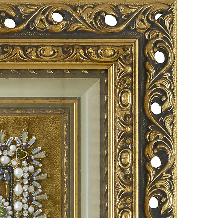 The embroidered icon "Our Lady of Ostrobram" in a frame