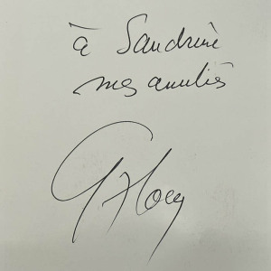 An autographed photo. Guy Ru