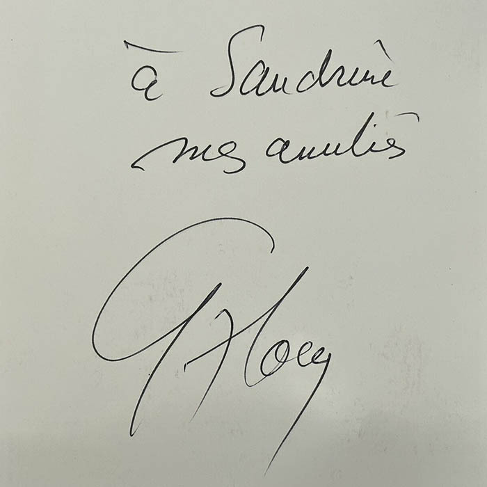 An autographed photo. Guy Ru