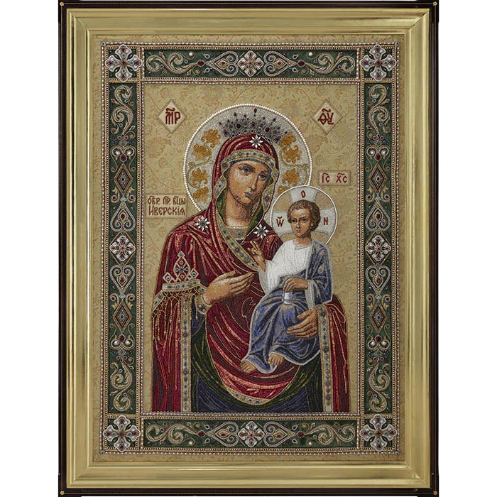 Embroidered icon of Our Lady of Iveria in a frame and a kiosk