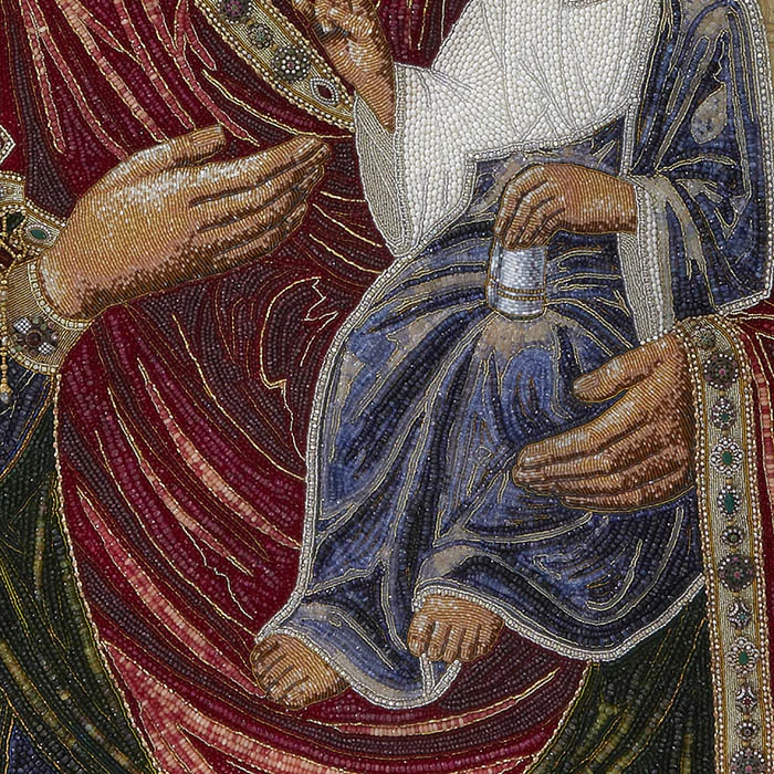 Embroidered icon of Our Lady of Iveria in a frame and a kiosk