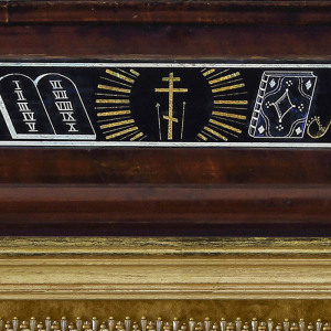 The embroidered icon "Our Lady of Feodorovskaya" in a frame and a kiosk