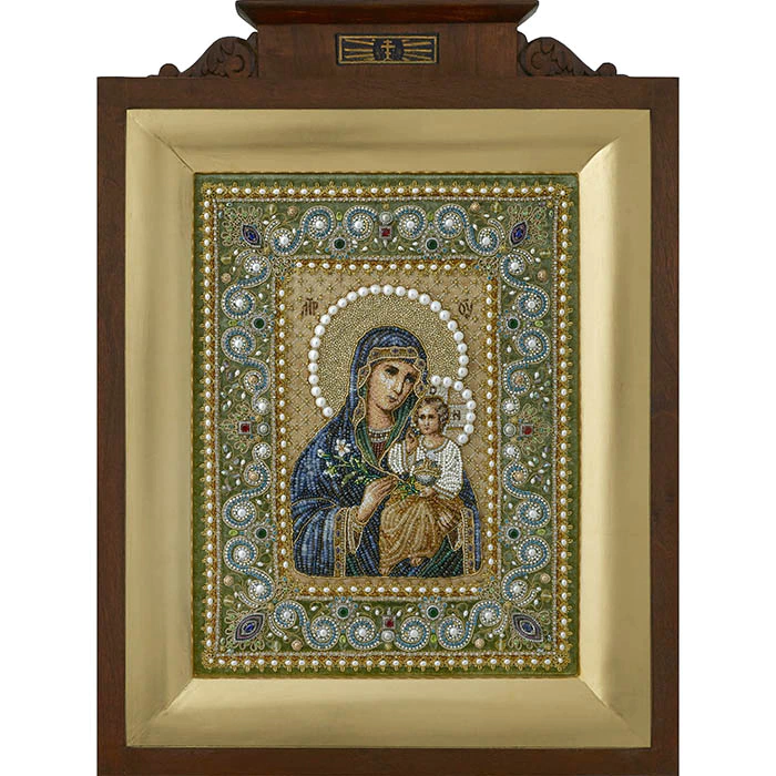 The embroidered icon "Our Lady of Unfading Color" in a frame and antique case