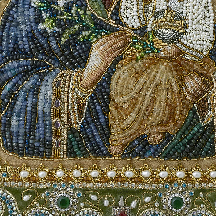 The embroidered icon "Our Lady of Unfading Color" in a frame and antique case