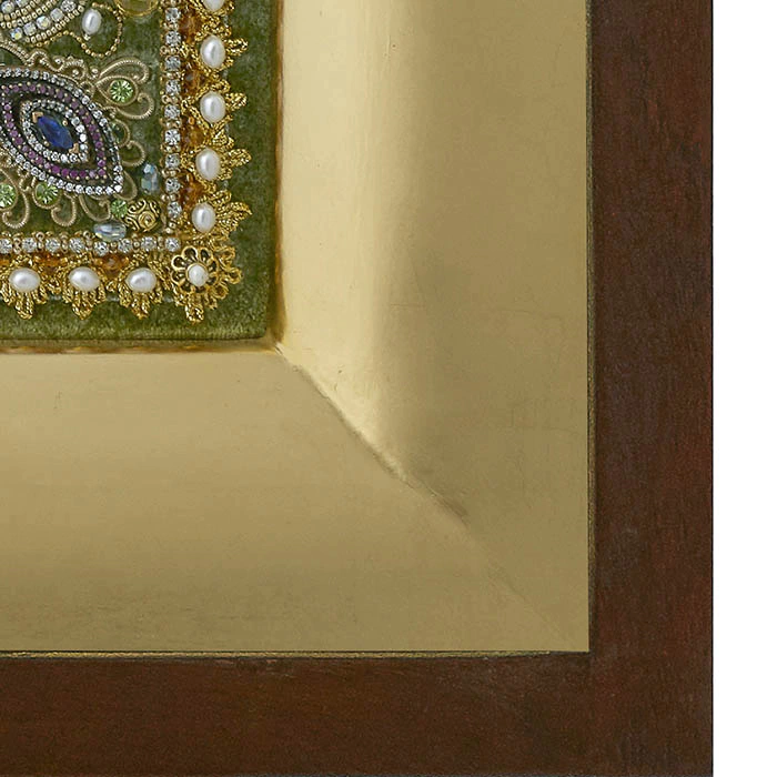 The embroidered icon "Our Lady of Unfading Color" in a frame and antique case