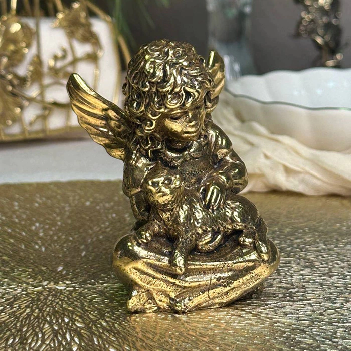 Brass statuette "Angel with a cat"