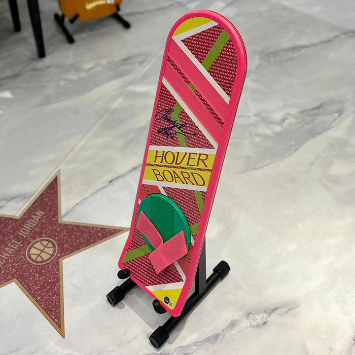 Replica hoverboard from the movie "Back to the Future" signed by actor Christopher Lloyd