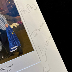 Autographed photos of twelve golfers and their team captain Jose Maria Olazabal.