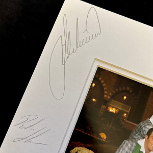 Autographed photos of twelve golfers and their team captain Jose Maria Olazabal.