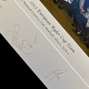 Autographed photos of twelve golfers and their team captain Jose Maria Olazabal.
