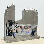 Banksy art object on an authentic element of the Israeli-Palestinian Wall