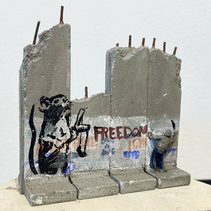 Banksy art object on an authentic element of the Israeli-Palestinian Wall