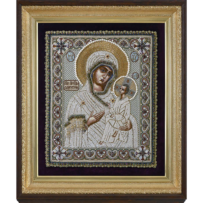 The embroidered icon of Our Lady of Odigitria in a frame and antique case