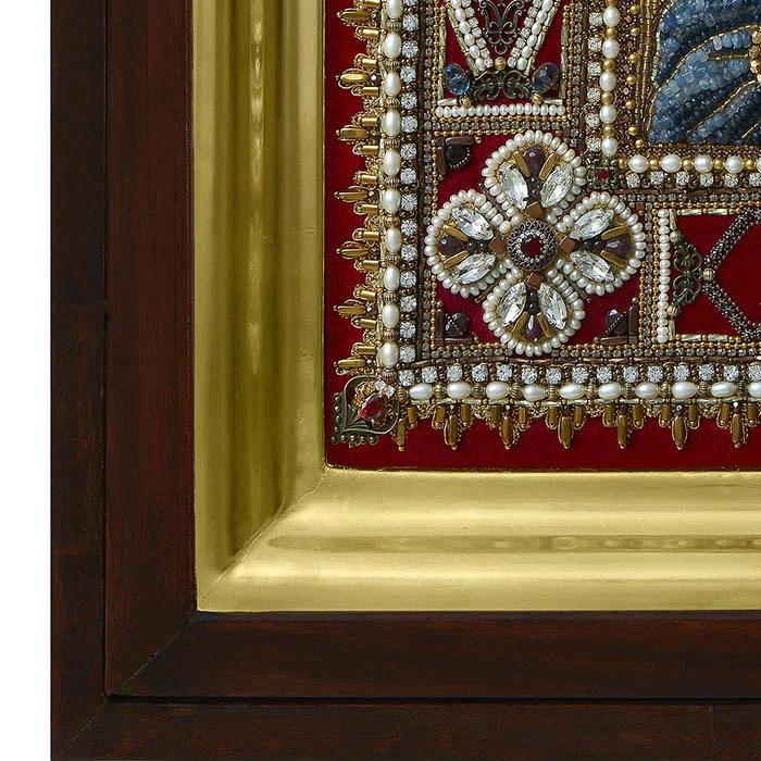 The embroidered icon "Archangel Michael" in an antique kiosk