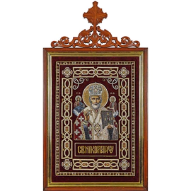 Embroidered icon of St. Nicholas the Wonderworker in a frame and a kiosk
