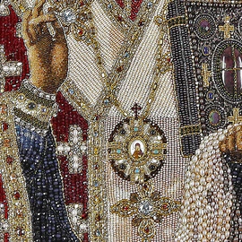 Embroidered icon of St. Nicholas the Wonderworker in a frame and a kiosk