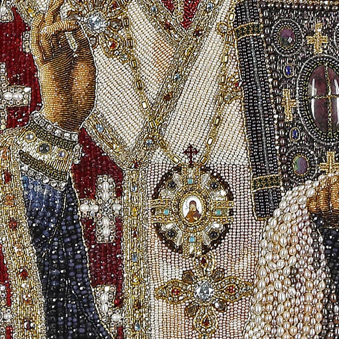 Embroidered icon of St. Nicholas the Wonderworker in a frame and a kiosk