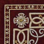 Embroidered icon of St. Nicholas the Wonderworker in a frame and a kiosk