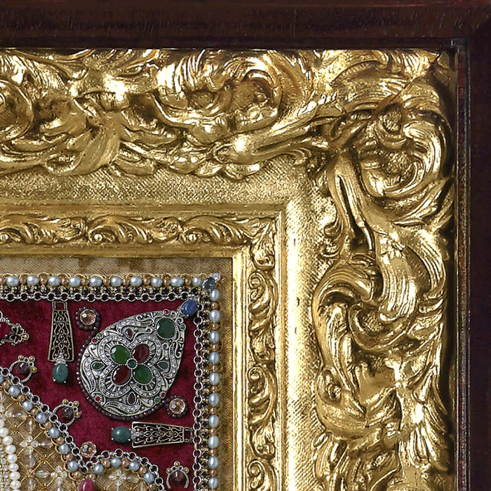 The embroidered icon "Blessed Prince Dimitri Donskoy" in an antique frame and a kiosk
