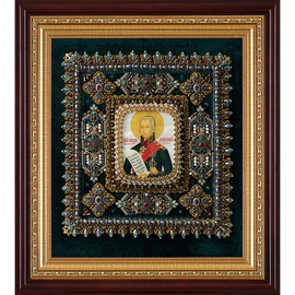 The embroidered icon "The Righteous Warrior Feodor Ushakov" in a frame and a case