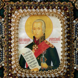 The embroidered icon "The Righteous Warrior Feodor Ushakov" in a frame and a case