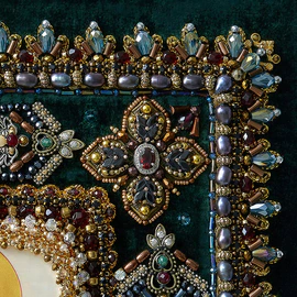 The embroidered icon "The Righteous Warrior Feodor Ushakov" in a frame and a case
